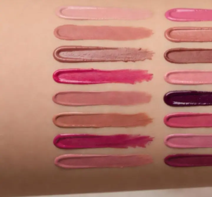 Lip colour swatches in trending seasonal shades presented in soft pink and plum tones.
